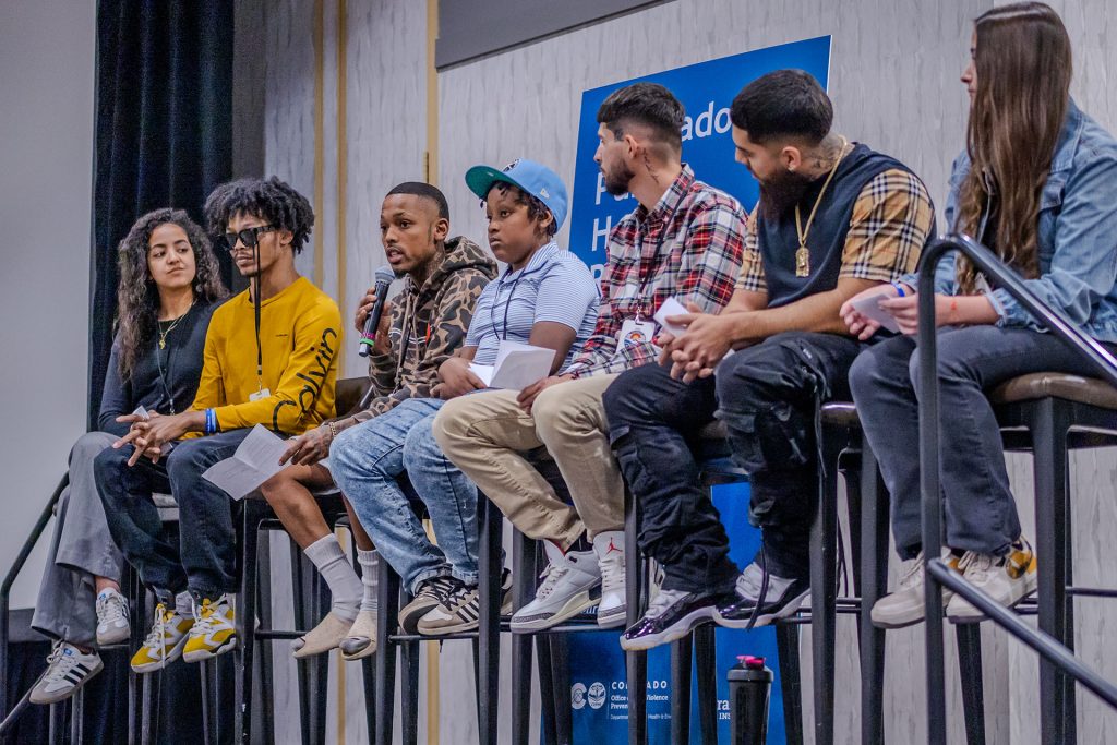 Youth leaders facilitating a panel session at Colorado's 2024 Public Health Roundtable on Firearm-Related Harm and Violence Prevention