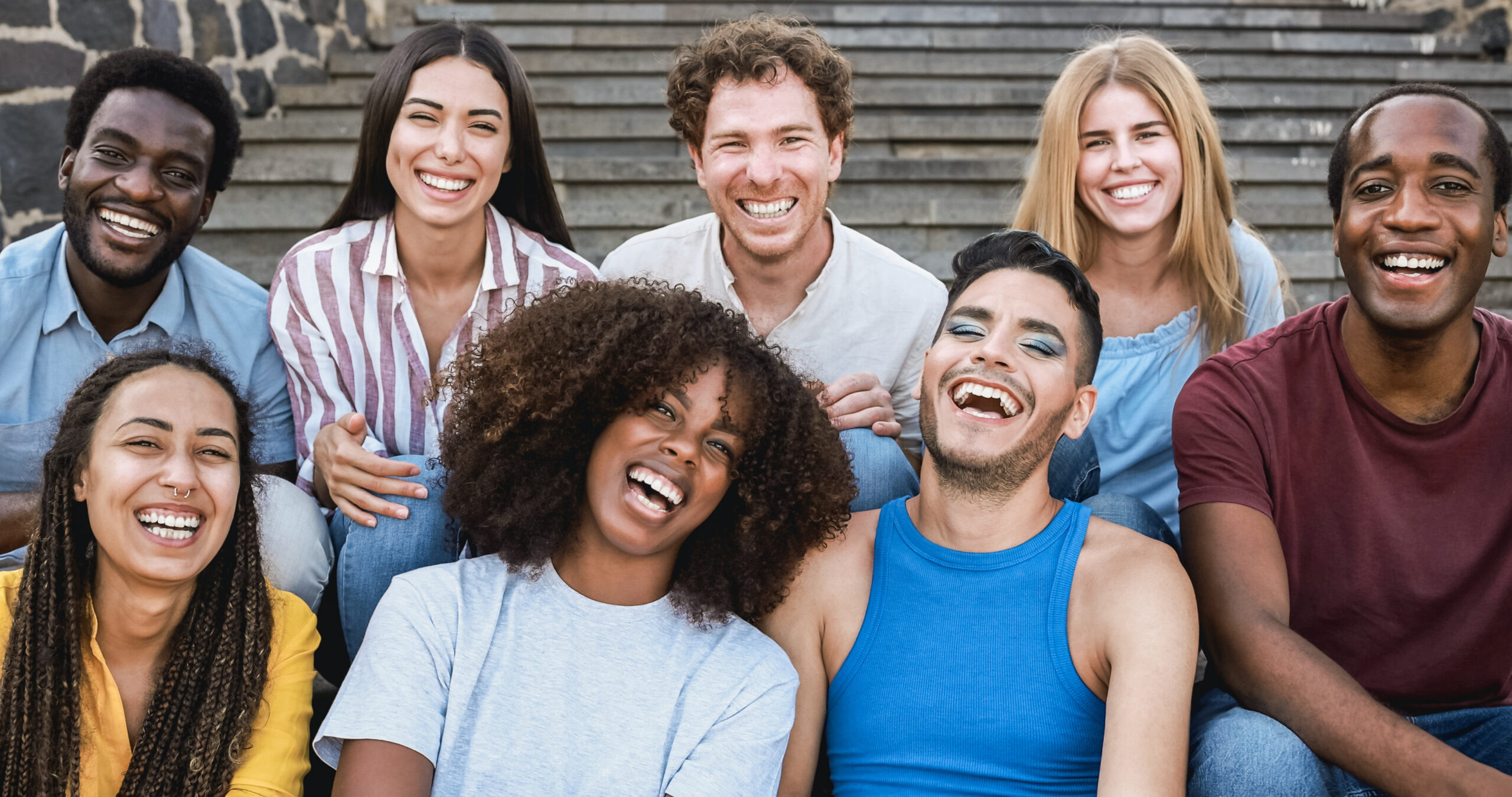 Young diverse people having fun outdoor in the city - Focus on gay man face